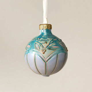 Intricately carved and glazed ceramic globe ornament with ivory satin ribbon – Ornament No. 466
