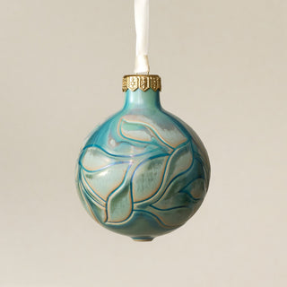 Intricately carved and glazed ceramic globe ornament with ivory satin ribbon – Ornament No. 468