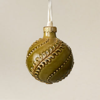 Intricately carved and glazed ceramic globe ornament with ivory satin ribbon – Ornament No. 470