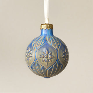 Intricately carved and glazed ceramic globe ornament with ivory satin ribbon – Ornament No. 471
