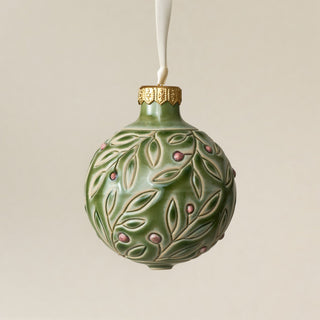 Intricately carved and glazed ceramic globe ornament with ivory satin ribbon – Ornament No. 472