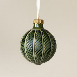 Intricately carved and glazed ceramic globe ornament with ivory satin ribbon – Ornament No. 474