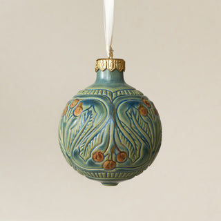 Intricately carved and glazed ceramic globe ornament with ivory satin ribbon – Ornament No. 479