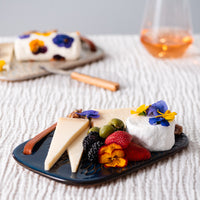 Plated & Poured: Wine & Cheese with The Rhined