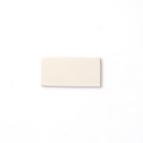 Reminiscent of ancient alabaster sculptures, this soft white glaze is consistent in both color and surface texture and presents an opaque break on relief details as well as the tile edge.