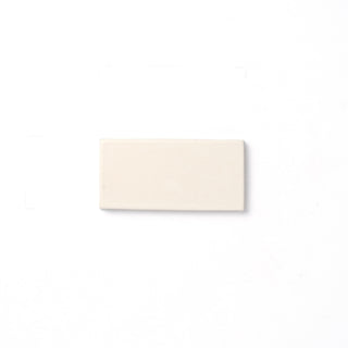 Reminiscent of ancient alabaster sculptures, this soft white glaze is consistent in both color and surface texture and presents an opaque break on relief details as well as the tile edge.