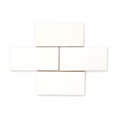 Himalaya recalls its mountain range namesake offering slight variation in its off-white hue, a high-gloss surface texture, and an opaque break around edges and relief details.