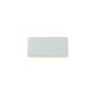 A noteworthy glaze, Misty Moon offers blended powder blue and cream tones and a high gloss surface texture with potential for crazing.