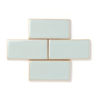 A noteworthy glaze, Misty Moon offers blended powder blue and cream tones and a high gloss surface texture with potential for crazing.