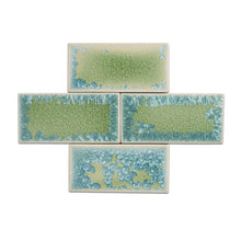 Load image into Gallery viewer, With a bright green crackle base speckled with light blue crystals, Molokai is a highly varying glaze. Each piece of ceramic tile glazed in this color will react in its own unique way, bringing an unparalleled depth to any space it is featured.
