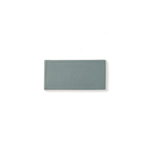 This dusty blue glaze presents a consistent color, has a smooth matte surface texture and an opaque edge break, making it the perfect compliment in any space.