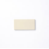 This glaze is a light neutral yellow offering a subtle warmth and showcasing a high-gloss surface texture and opaque edge break.